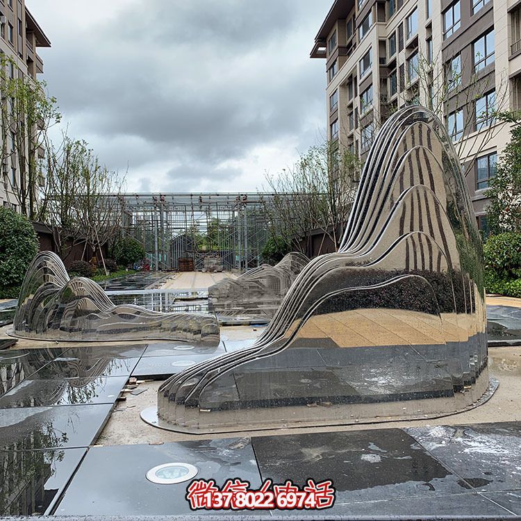 假山雕塑+不銹鋼噴泉，完美結(jié)合抽象鏡面美學