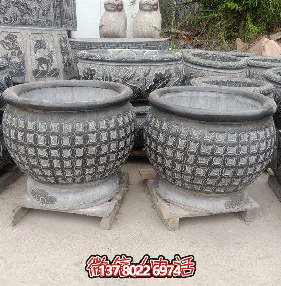 自然美學(xué)結(jié)合青石石雕、浮雕、編織、雕塑的戶外園林魚缸